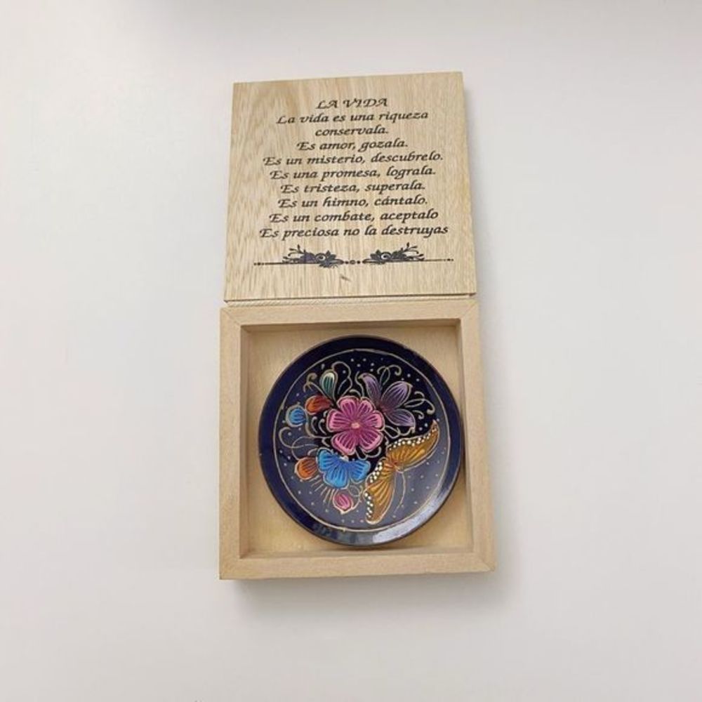 Little cute wood box with a small plate inside